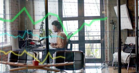 African American Businessman Analyzing Finance Data in Modern Office - Download Free Stock Images Pikwizard.com