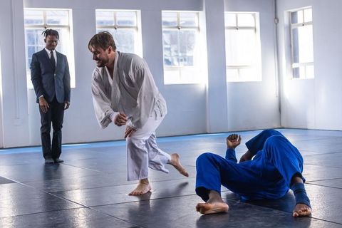 Martial Arts Training Session with Instructor Observation