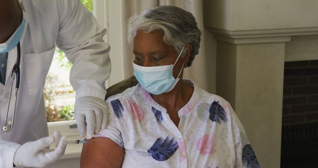 Senior Woman Receiving Vaccine from Medical Professional - Download Free Stock Images Pikwizard.com