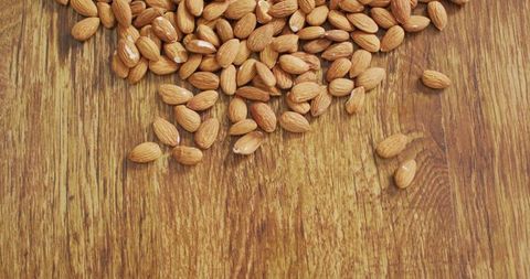 Almonds on Rustic Wooden Surface for Vegan and Healthy Eating - Download Free Stock Images Pikwizard.com