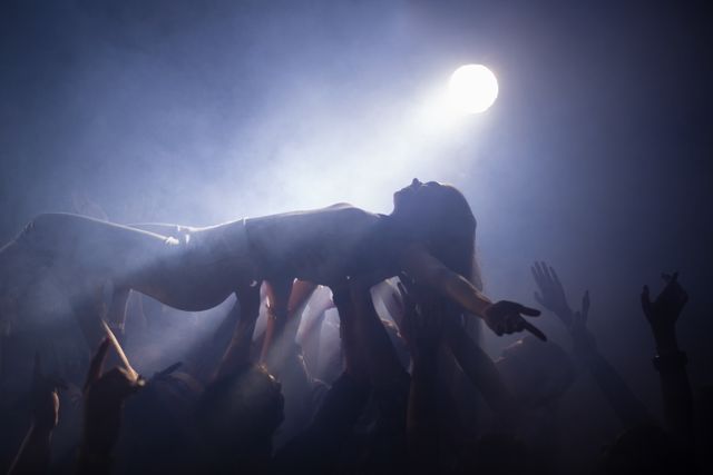 Crowd Surfing at Concert in Nightclub - Download Free Stock Photos Pikwizard.com