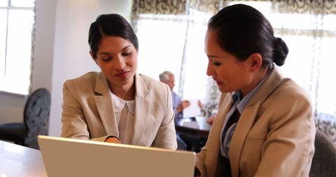 Professional Businesswomen Collaborating at Cafeteria - Download Free Stock Images Pikwizard.com