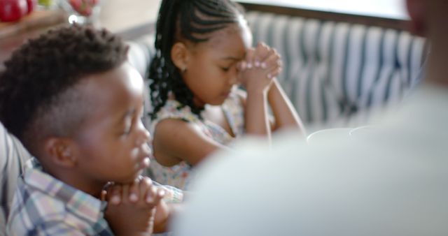 Children Praying Together at Family Meal - Download Free Stock Images Pikwizard.com