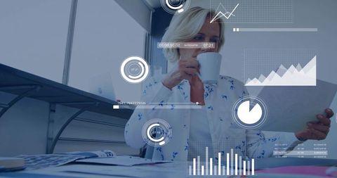 Senior woman drinking coffee and reading report with data analytics overlays in office
