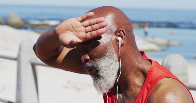 Senior Man Sweating While Exercising Outdoors by Beach - Download Free Stock Images Pikwizard.com