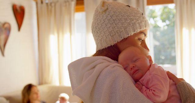 Mother Holding Sleeping Baby Close in Cozy Living Room - Download Free Stock Images Pikwizard.com