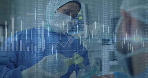 Doctor in icu with ventilator preparing patient for treatment