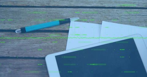 Displaying Tablet and Turquoise Pen on Rustic Wooden Desk with Green Data Overlay for Tech