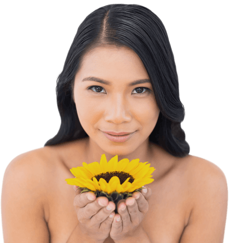 natural model with black hair holding vibrant sunflower on transparent background - Download Free Stock Videos Pikwizard.com