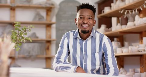 Happy African American Potter in Ceramic Studio Smiling
