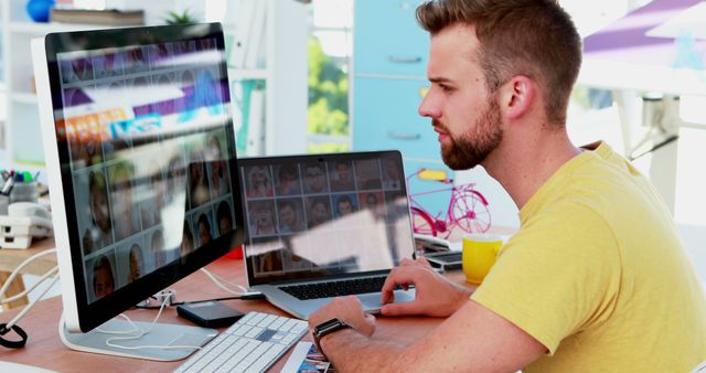 Young Designer Working on Computer and Laptop - Download Free Stock Images Pikwizard.com