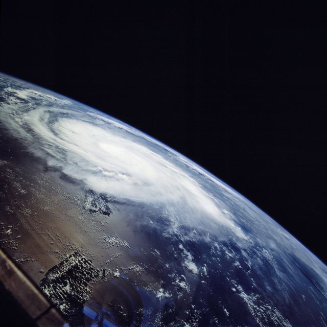 This stunning satellite view of Hurricane Marilyn moving over Puerto Rico was captured from the Space Shuttle Endeavour during its mission in September 1995. Featuring Earth's dramatic weather patterns and atmospheric phenomena, this visual is perfect for educational materials, scientific publications, weather forecasting analysis, and space exploration presentations. The image highlights the power and beauty of nature from a unique perspective.