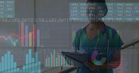 Medical Professional Analyzing Data on Digital Charts in Hospital Corridor