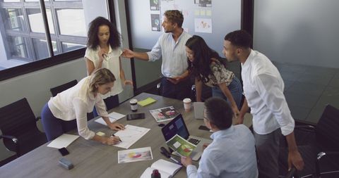 Dynamic Business Team Collaborating in Modern Office - Download Free Stock Images Pikwizard.com