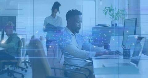 Typing and collaborating at digital workspace with holographic data overlay in open office