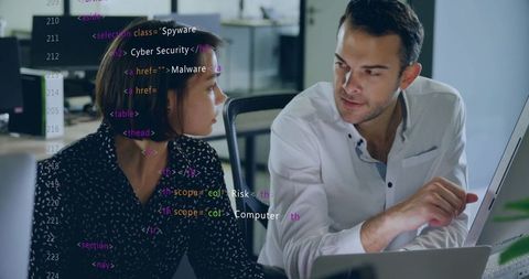 Team discussing html cybersecurity code in modern office