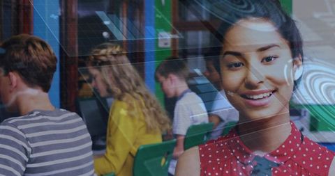 Smiling student in computer lab with futuristic elements