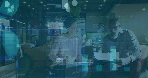 Collaborating on Business Data in Modern Office Lounge