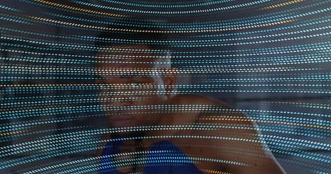 Futuristic Visualization of Contemplative Man with Translucent Data Lines