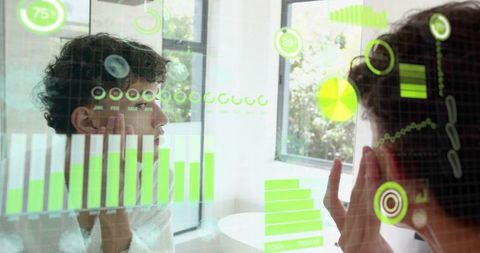 Young man inspecting skin using augmented reality mirror displaying health analytics
