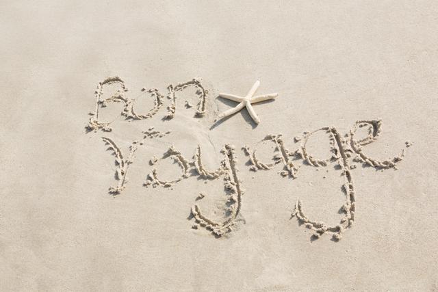 Bon Voyage Written in Sand with Starfish on Beach - Download Free Stock Photos Pikwizard.com
