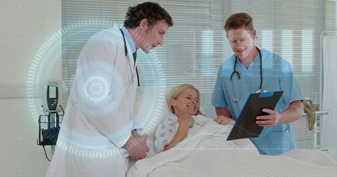 Doctor and nurse reviewing patient chart at hospital bed with medical hud overlay