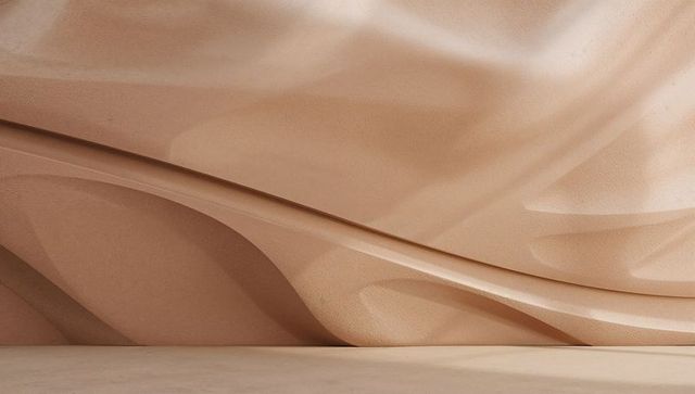 Undulating beige sculptural wall with recessed seam and textured grain, minimalist design
