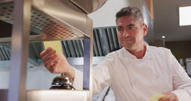 Chef Taking Food Order in a Professional Kitchen - Download Free Stock Images Pikwizard.com