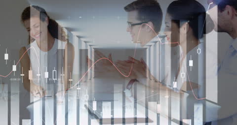 Business Team Analyzing Financial Data and Graphs Overlay