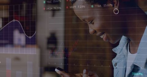 African American Woman Engaged with Stock Trading Data - Download Free Stock Images Pikwizard.com