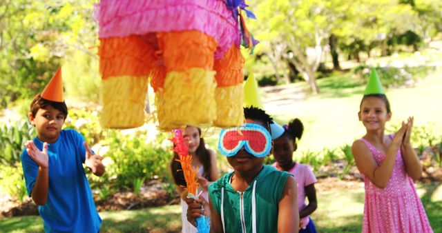 Children Celebrating Outdoor Birthday with Colorful Piñata - Download Free Stock Images Pikwizard.com