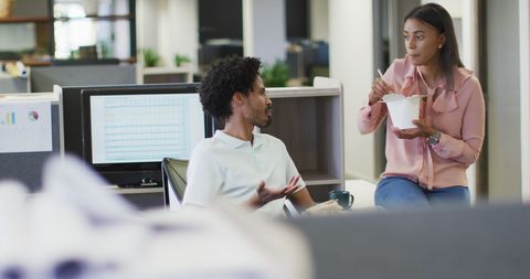 Business Professionals take a Break in Office Environment