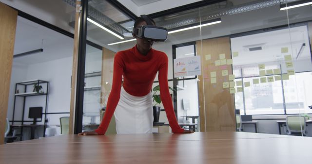 Businesswoman Immersed in Virtual Reality in Modern Office - Download Free Stock Images Pikwizard.com