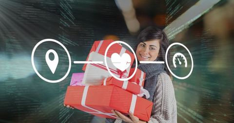 Caucasian Woman with Presents Amidst Digital Data Background