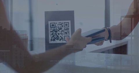 Contactless mobile payment exchange at retail counter with qr code stand