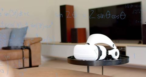 Resting white vr headset on black side table in modern minimal living room with ar overlay