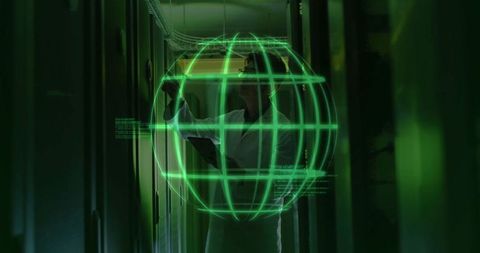 Technician reviewing holographic globe in a data center