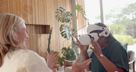 Diverse Family Experimenting with VR Headset in Modern Living Room