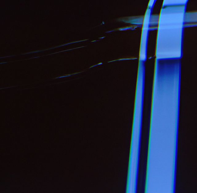 Image of close up of film blue light leak overlay. Light, camera, film and photography concept.