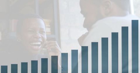 Laughing Business Professionals Discussing Growth and Analytics