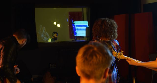 Band performing in recording studio