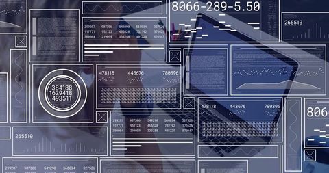 Business Professional Analyzing Data with Laptop and Charts on Desk