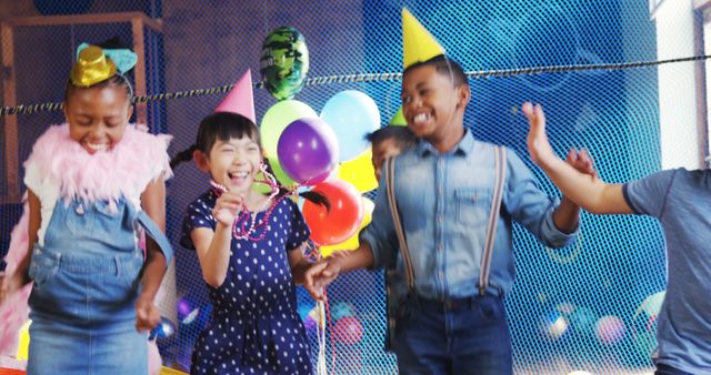 Children Laughing and Holding Hands at Birthday Party Event - Download Free Stock Images Pikwizard.com