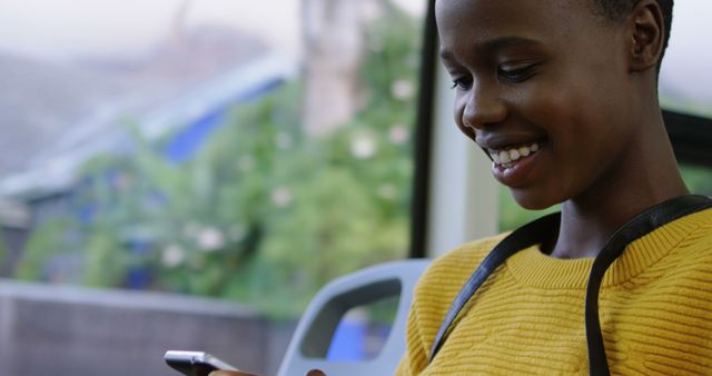 Smiling Young Woman Checking Her Smartphone Outdoors - Download Free Stock Images Pikwizard.com