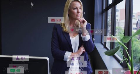 Businesswoman Tracking Digital Engagement Data at Office