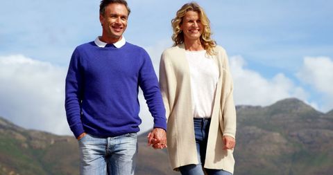 Middle-aged Couple Enjoying a Scenic Outdoor Walk