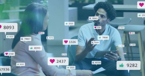 Coworkers Collaborating in Office Lounge with Social Media Engagement Overlays