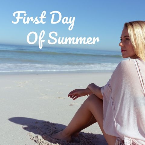 Young Woman Relaxing on Beach on Summer Day