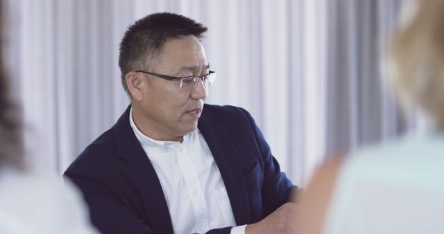 Businessman Discussing During Meeting in Modern Office - Download Free Stock Images Pikwizard.com