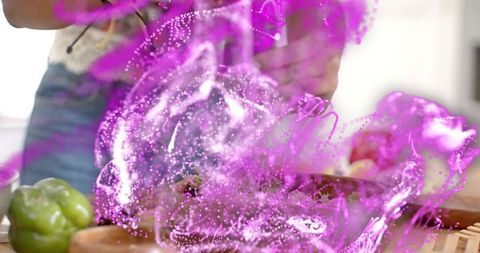 Home Chef Chopping Green Pepper on Wooden Board with Vivid Purple Energy Swirl